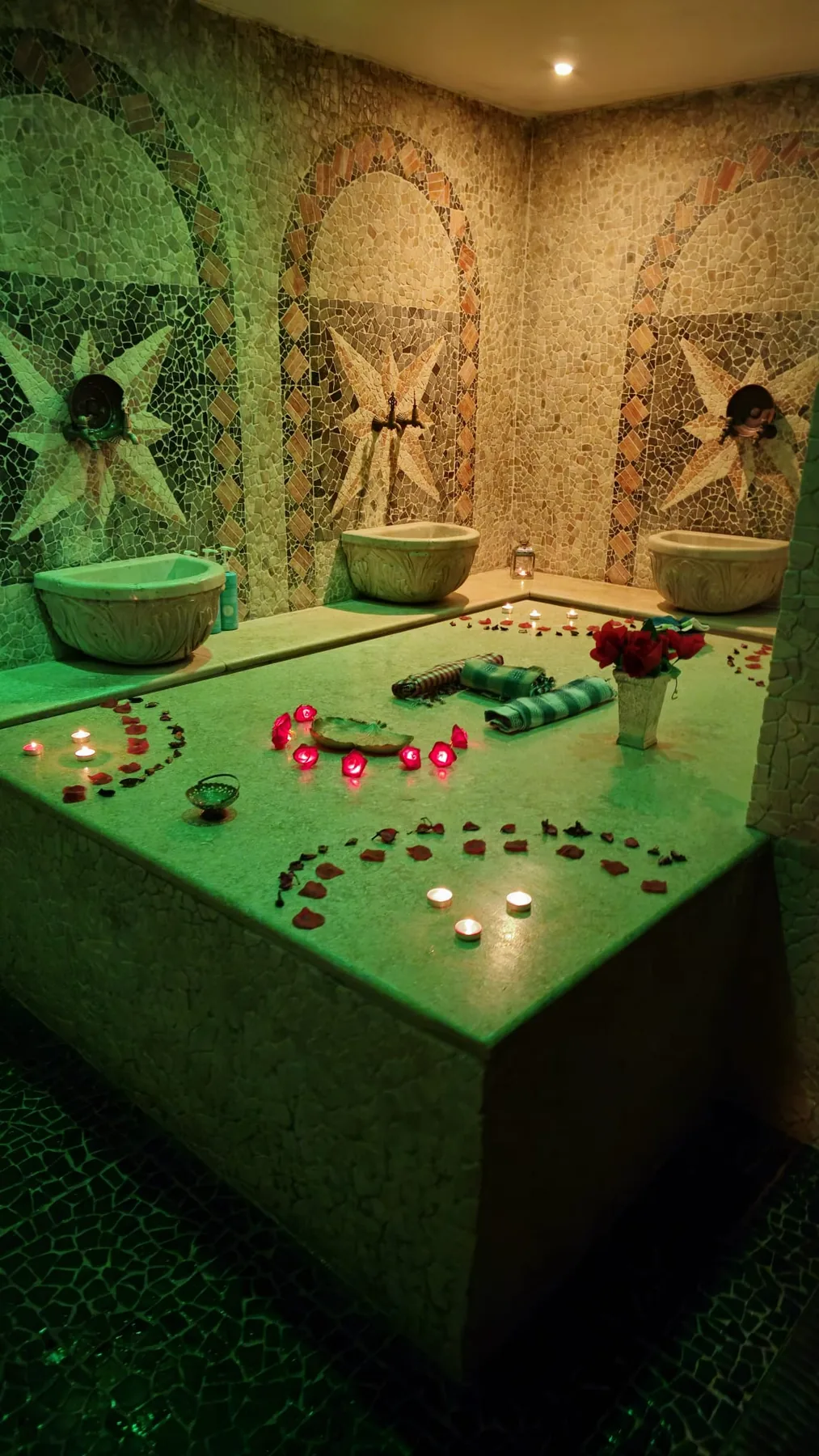 A treatment room with green lighting